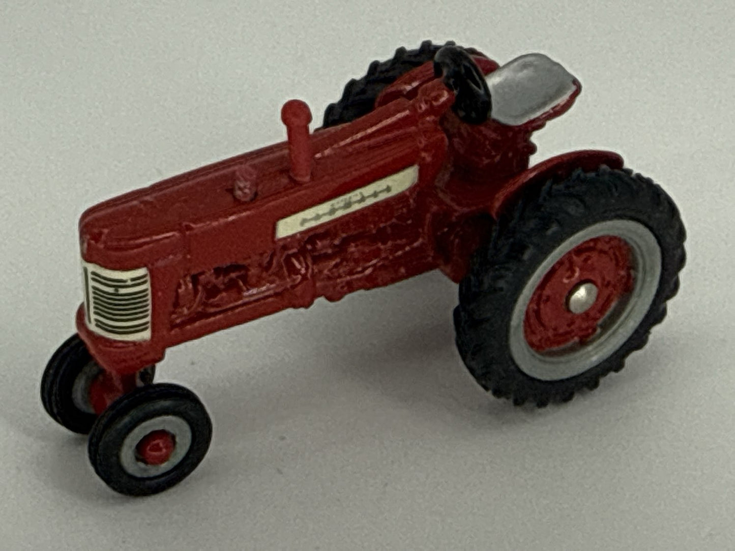 ERTL McCormick Farmall 350 Diecast Tractor & Blue Steamroller Toy Lot