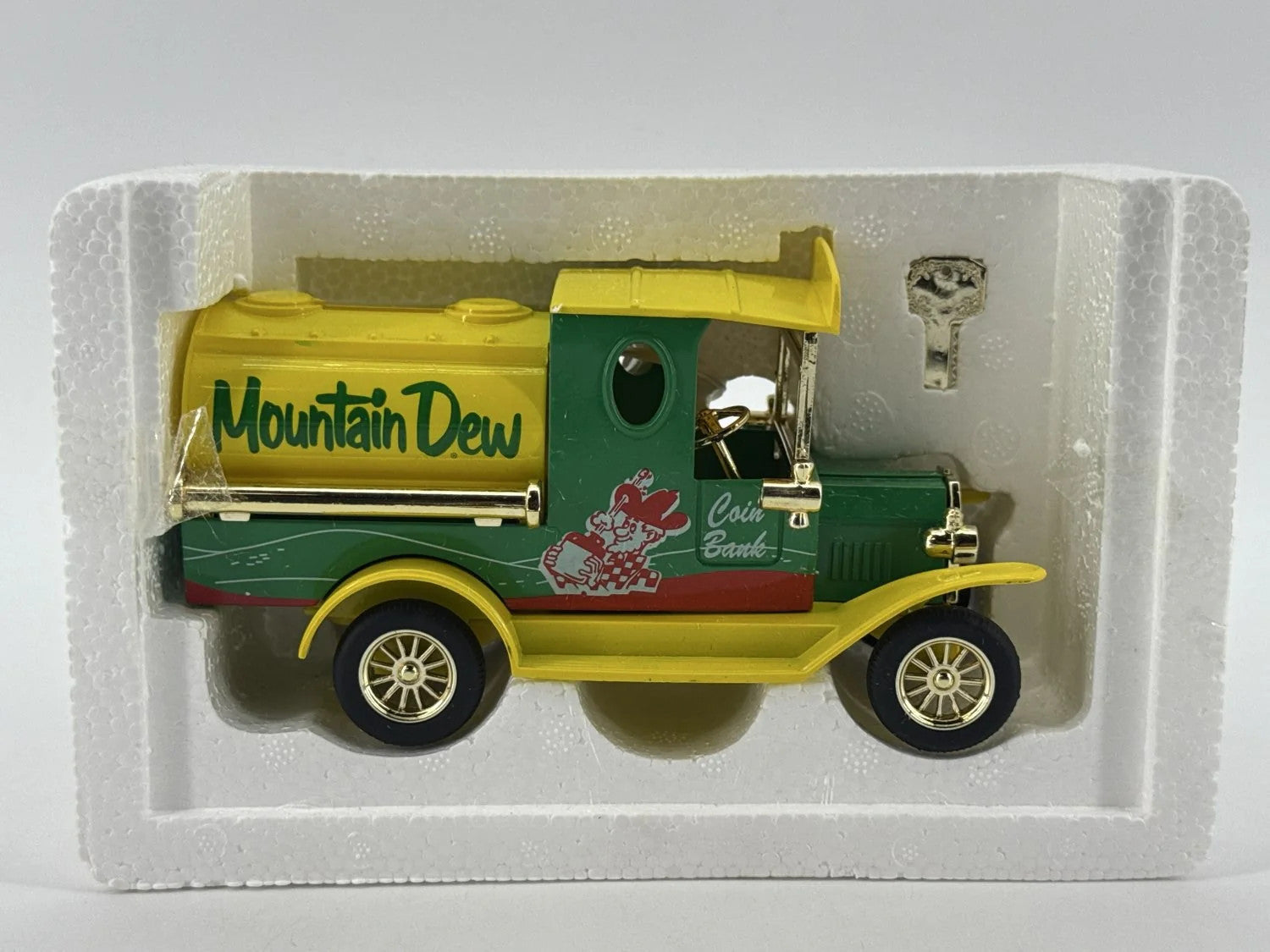 Golden Wheel Mountain Dew Tanker Coin Bank Model w/ Key Gold