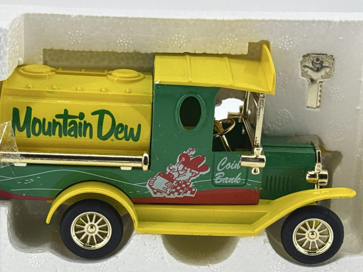 Golden Wheel Mountain Dew Tanker Coin Bank Model w/ Key Gold
