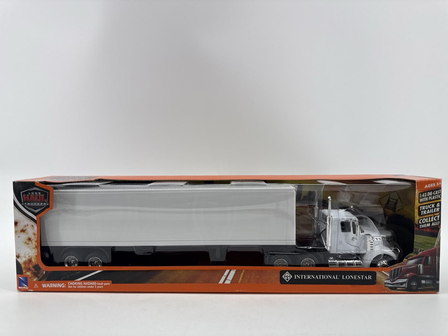 New-Ray Int'l Lonestar Trucker 1:43 Diecast Truck & Trailer